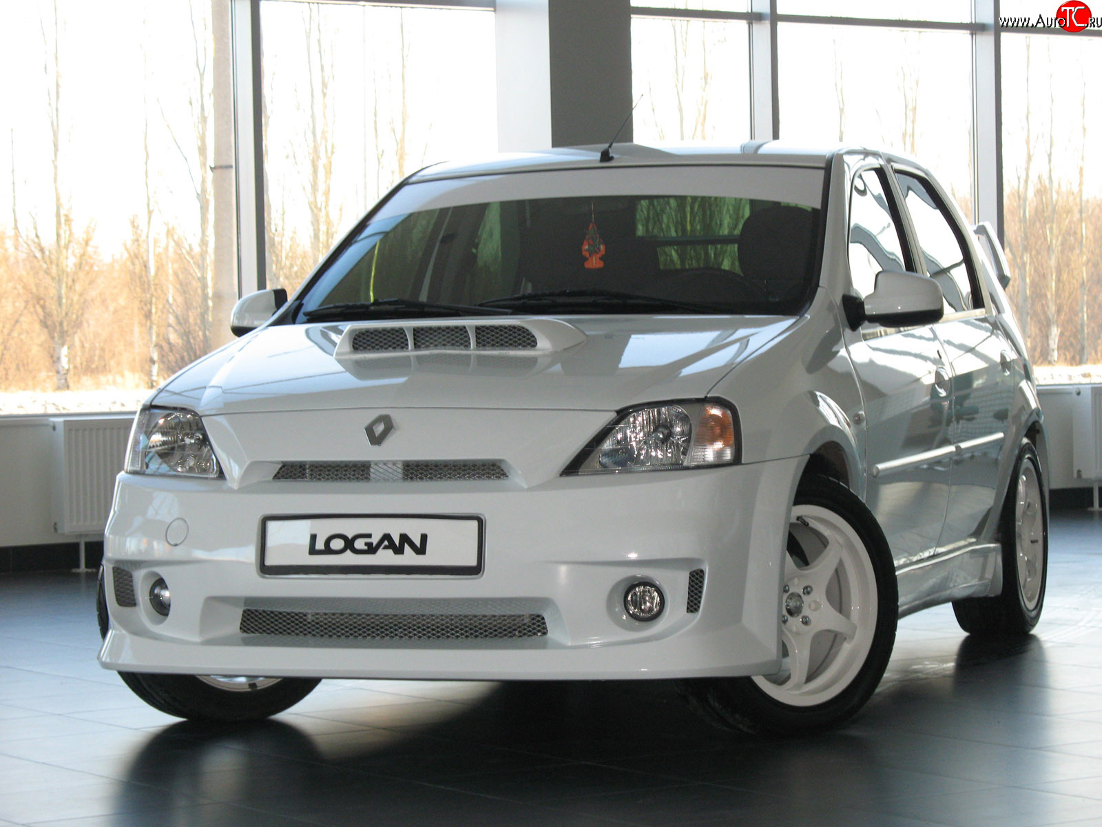 11 999 р. Передний бампер Power DM Renault Logan 1 дорестайлинг (2004-2010) (Без сетки, Неокрашенный)  с доставкой в г. Керчь