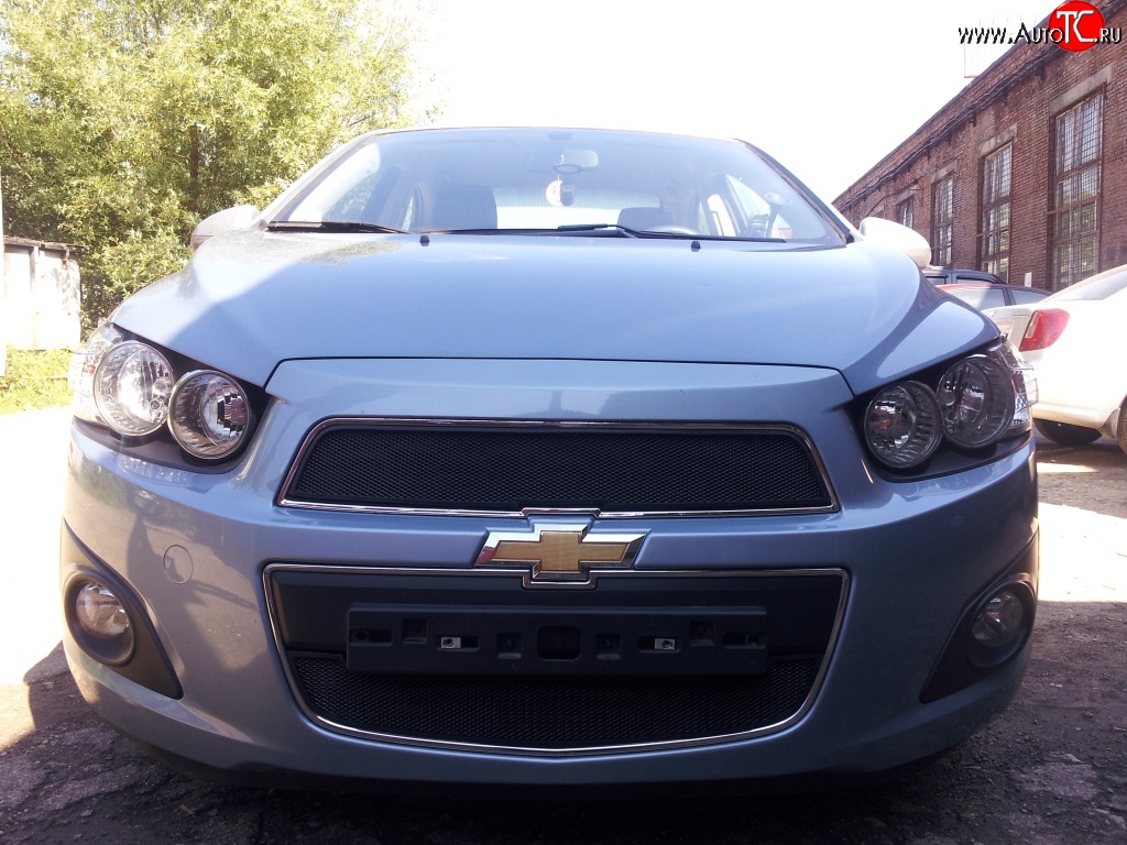 1 469 р. Нижняя сетка на бампер Russtal (черная) Chevrolet Aveo T300 седан (2011-2015)  с доставкой в г. Керчь