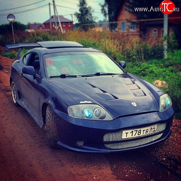9 649 р. Передний бампер Aston Hyundai Coupe (2002-2008) (Неокрашенный)  с доставкой в г. Керчь
