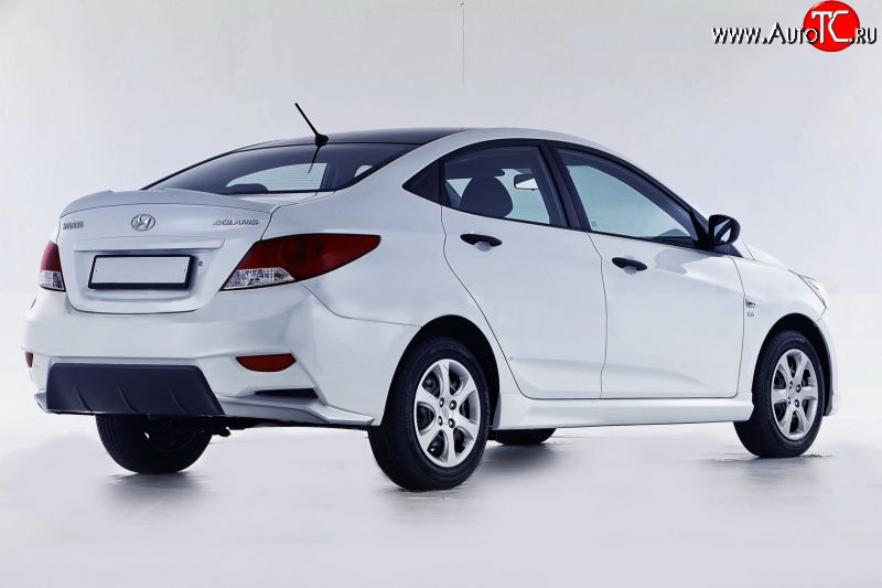 13 499 р. Задний бампер Sport Hyundai Solaris RBr седан дорестайлинг (2010-2014) (Неокрашенный)  с доставкой в г. Керчь