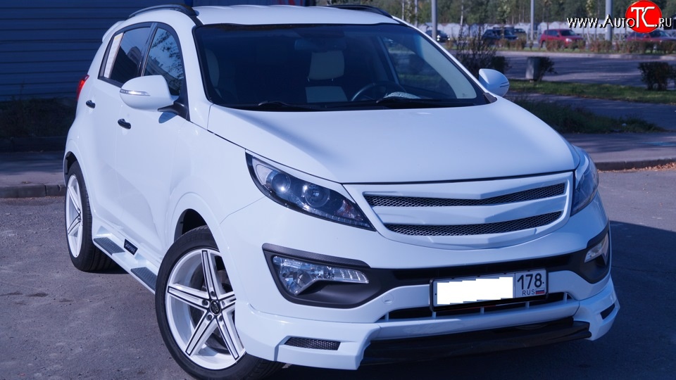 7 799 р. Накладка на передний бампер JSW Style  KIA Sportage  3 SL (2010-2014) дорестайлинг (Неокрашенная)  с доставкой в г. Керчь