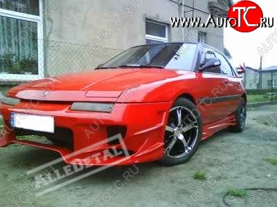 25 699 р. Передний бампер R1 Mazda 323 BW рестайлинг седан (1989-1993)  с доставкой в г. Керчь