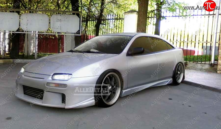 27 899 р. Передний бампер Next Mazda 323 BA дорестайлинг седан (1994-1996)  с доставкой в г. Керчь