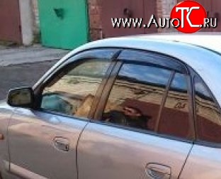 999 р. Комплект дефлекторов окон (ветровиков) 4 шт. Russtal Mazda 626 GF,FW универсал дорестайлинг (1997-1999)  с доставкой в г. Керчь