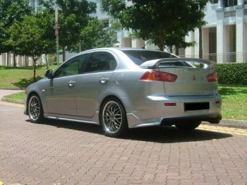7 499 р. Накладка заднего бампера Zodiak (под одинарный выхлоп) MV-Tuning  Mitsubishi Lancer  10 CY (2007-2017) седан дорестайлинг, седан рестайлинг (Неокрашенная)  с доставкой в г. Керчь. Увеличить фотографию 3