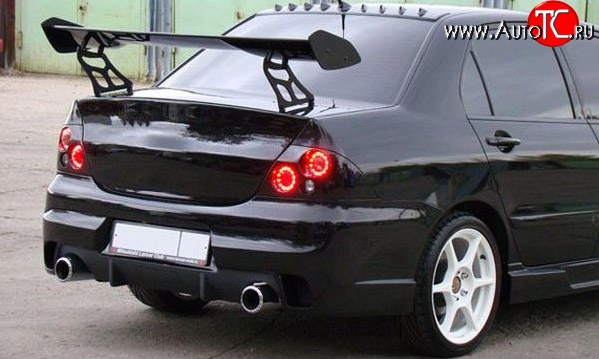 18 499 р. Задний бампер INGS Extreem  Mitsubishi Lancer  9 CS (2003-2009) седан 1-ый рестайлинг, седан 2-ой рестайлинг (Неокрашенный)  с доставкой в г. Керчь
