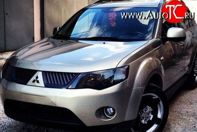 1 529 р. Темная защита передних фар SIM  Mitsubishi Outlander  XL (2005-2009) (CW)  дорестайлинг  с доставкой в г. Керчь