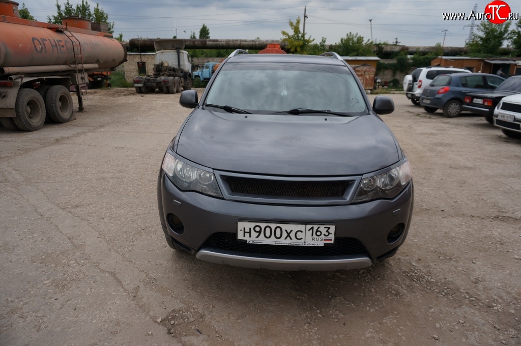 5 449 р. Решётка радиатора (рестайлинг) Sport Mitsubishi Outlander XL (CW)  рестайлинг (2010-2013) (Неокрашенная)  с доставкой в г. Керчь