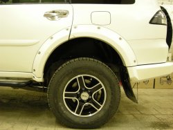 15 349 р. Накладки на колёсные арки BUSHWACKER Mitsubishi Pajero Sport PB дорестайлинг (2008-2013) (Неокрашенные)  с доставкой в г. Керчь. Увеличить фотографию 3