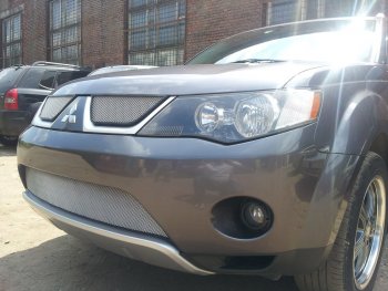 3 299 р. Защитная сетка в бампер (низ, ячейка 3х7 мм) Alfeco Стандарт Mitsubishi Outlander XL (CW)  дорестайлинг (2005-2009) (Хром)  с доставкой в г. Керчь. Увеличить фотографию 3