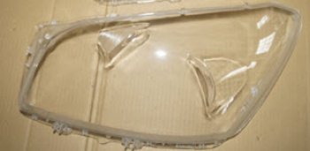 Левое стекло передней фары (пр-во Китай) BODYPARTS Toyota RAV4  XA305 (2005-2009) 5 дв. дорестайлинг