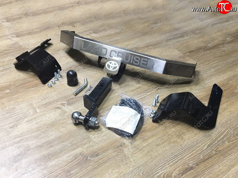 21 599 р. Фаркоп (тягово-сцепное устройство) TCC Тюнинг  Toyota Land Cruiser  200 (2012-2021) 1-ый рестайлинг, 2-ой рестайлинг (оцинкованный, шар E нержавейка, надпись Land Cruiser)  с доставкой в г. Керчь