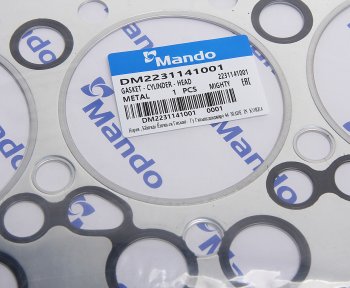 1 699 р. Прокладка головки блока HYUNDAI HD65,72,County дв.D4AL t=1.40мм (M) MANDO MANDO dm2231141001  с доставкой в г. Керчь. Увеличить фотографию 2
