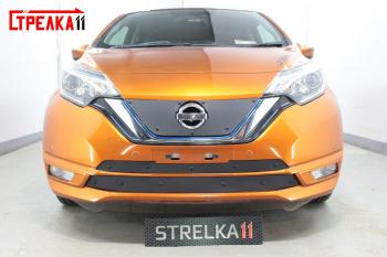 Зимняя заглушка решетки радиатора (Японская сборка) (верх) Стрелка11 Nissan Note 2 E12 рестайлинг (2016-2020) (черная)