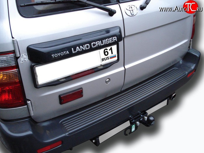 10 099 р. Фаркоп Лидер Плюс (с нержавеющей пластиной). Toyota Land Cruiser J105 (1998-2007) (Без электропакета)  с доставкой в г. Керчь