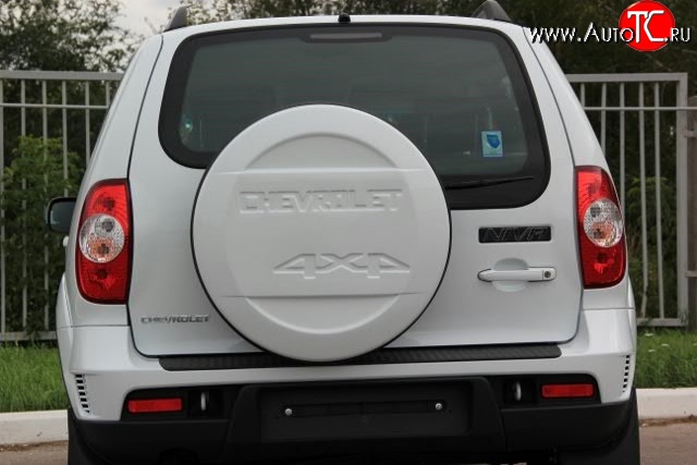 1 779 р. Чехол запасного колеса Chevrolet V4 Лада Нива Трэвел (212300-80) (2021-2025) (Окрашенный)  с доставкой в г. Керчь